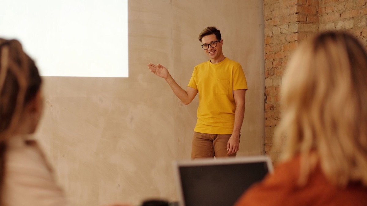 A young professional giving a presentation in an office